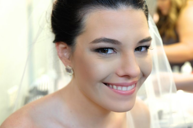 Close-up portrait of a smiling bride