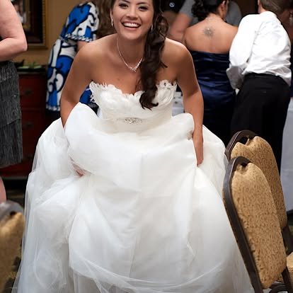 Bride laughing during the wedding reception