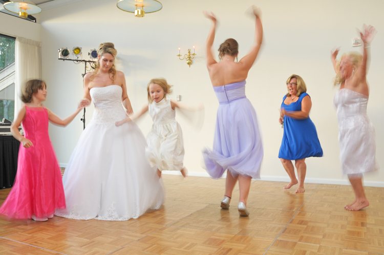 Wedding party dancing together
