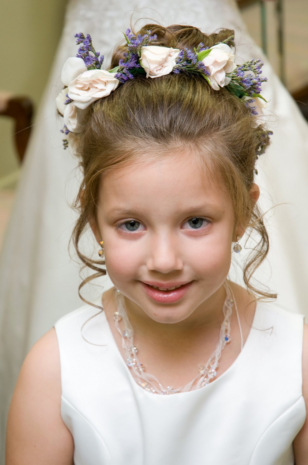 Flower girl wearing a crown of roses